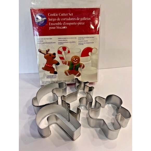 Wilton Christmas Cookie Cutter Set of 4, Gingerbread, Candy Cane, Santa Hat... - Picture 1 of 6